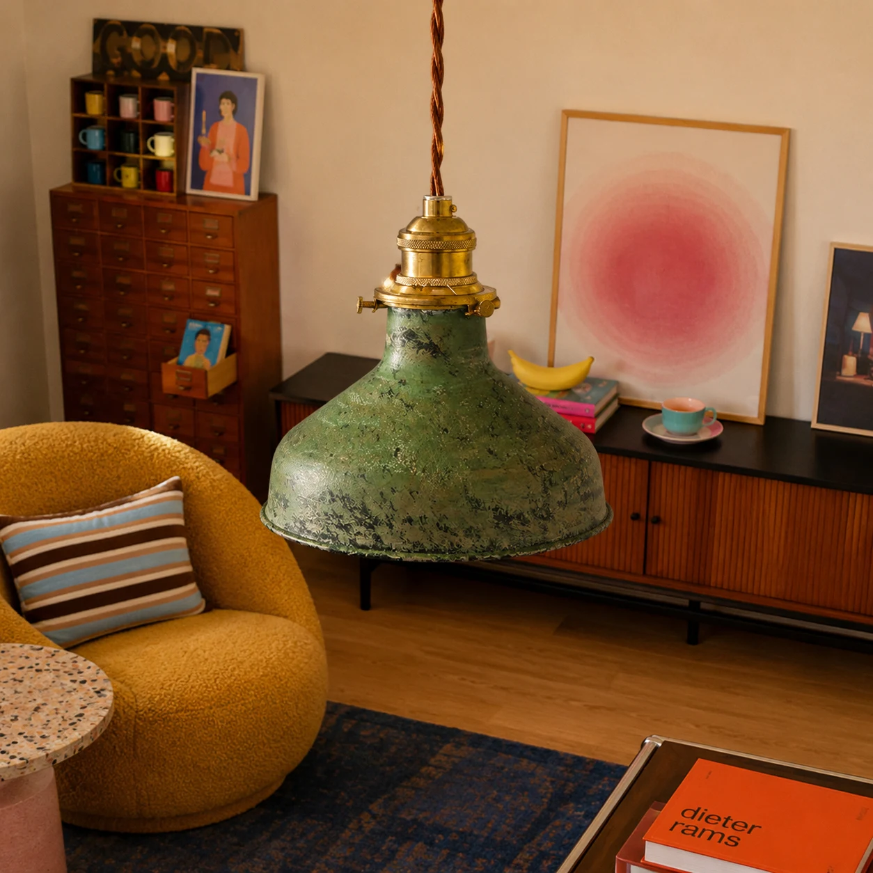 Distressed green pendant lamp in a colorful living room corner