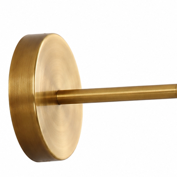Round antique brass wall plate and straight arm detail