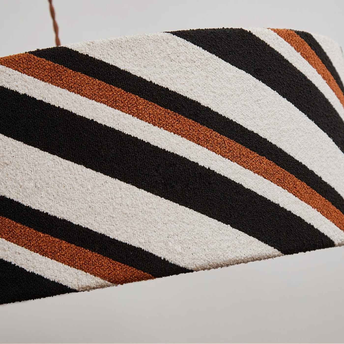 Striped fabric pendant light room detail
