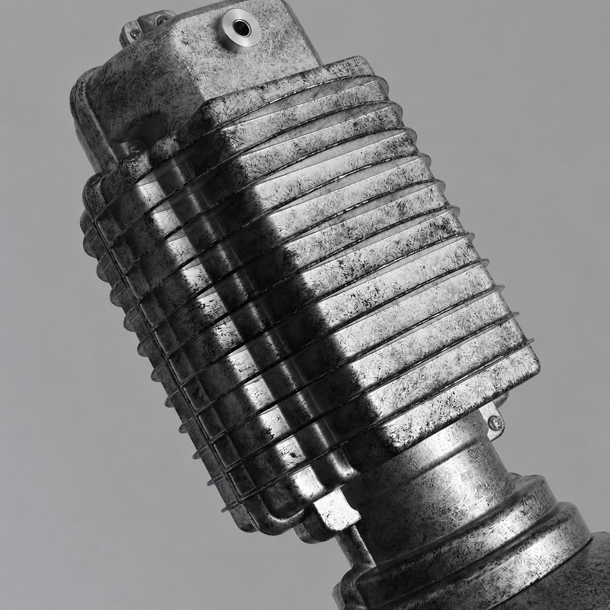 Textured metal socket and wire guard detail