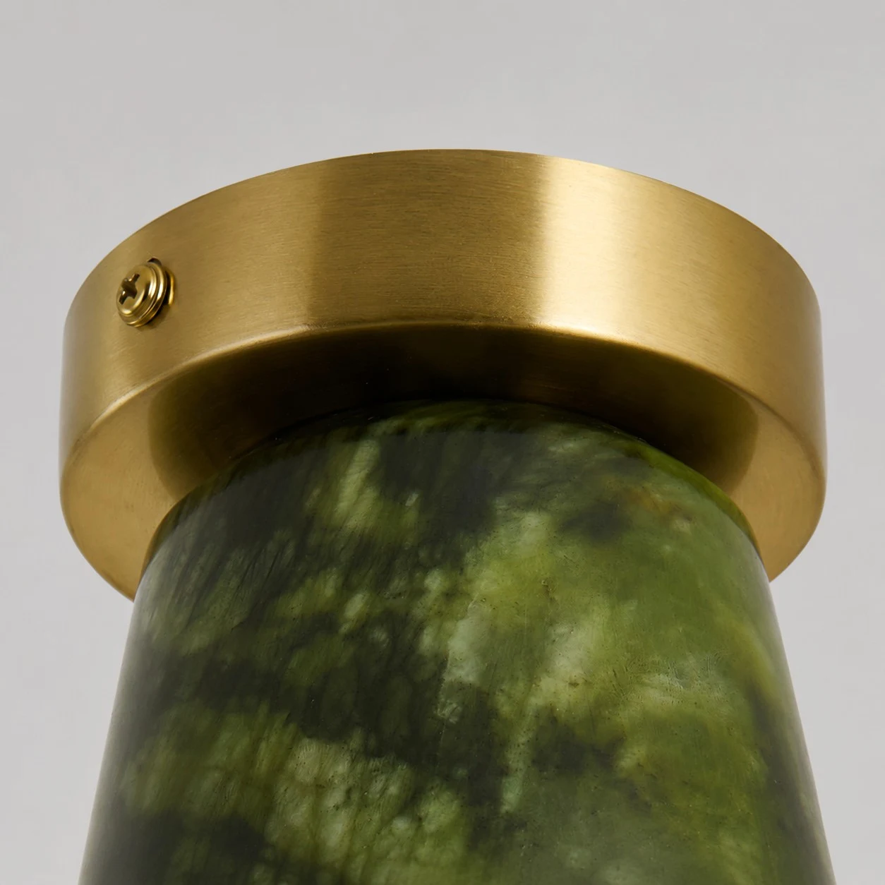 brushed gold metal ceiling cap detail