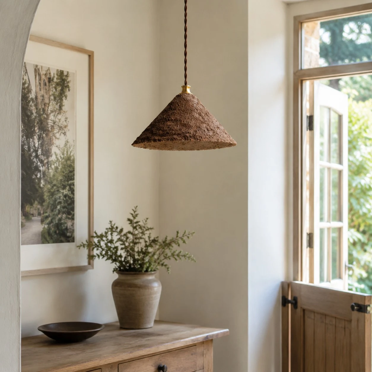 Textured cone pendant light in room setting