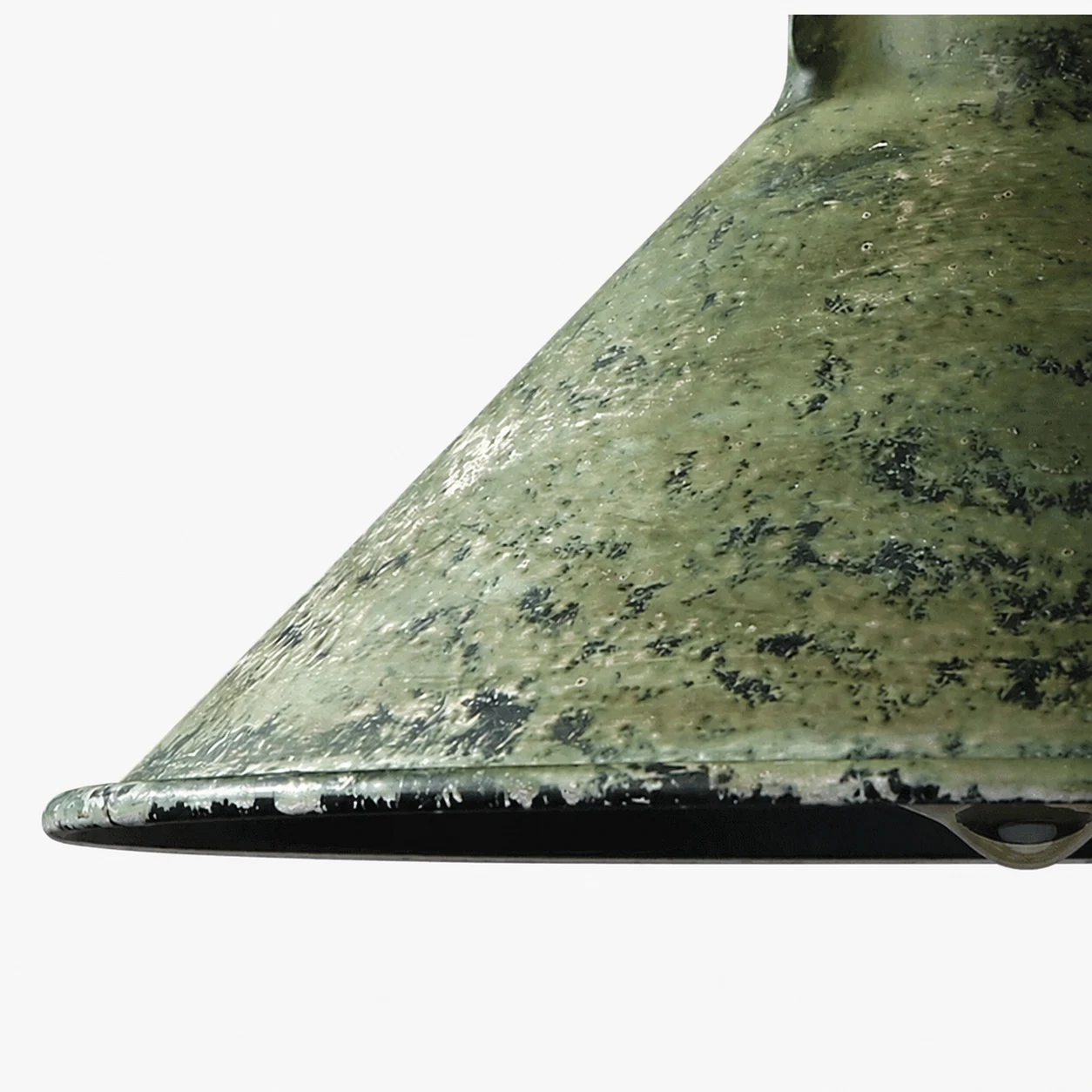Close view of distressed green metal shade rim