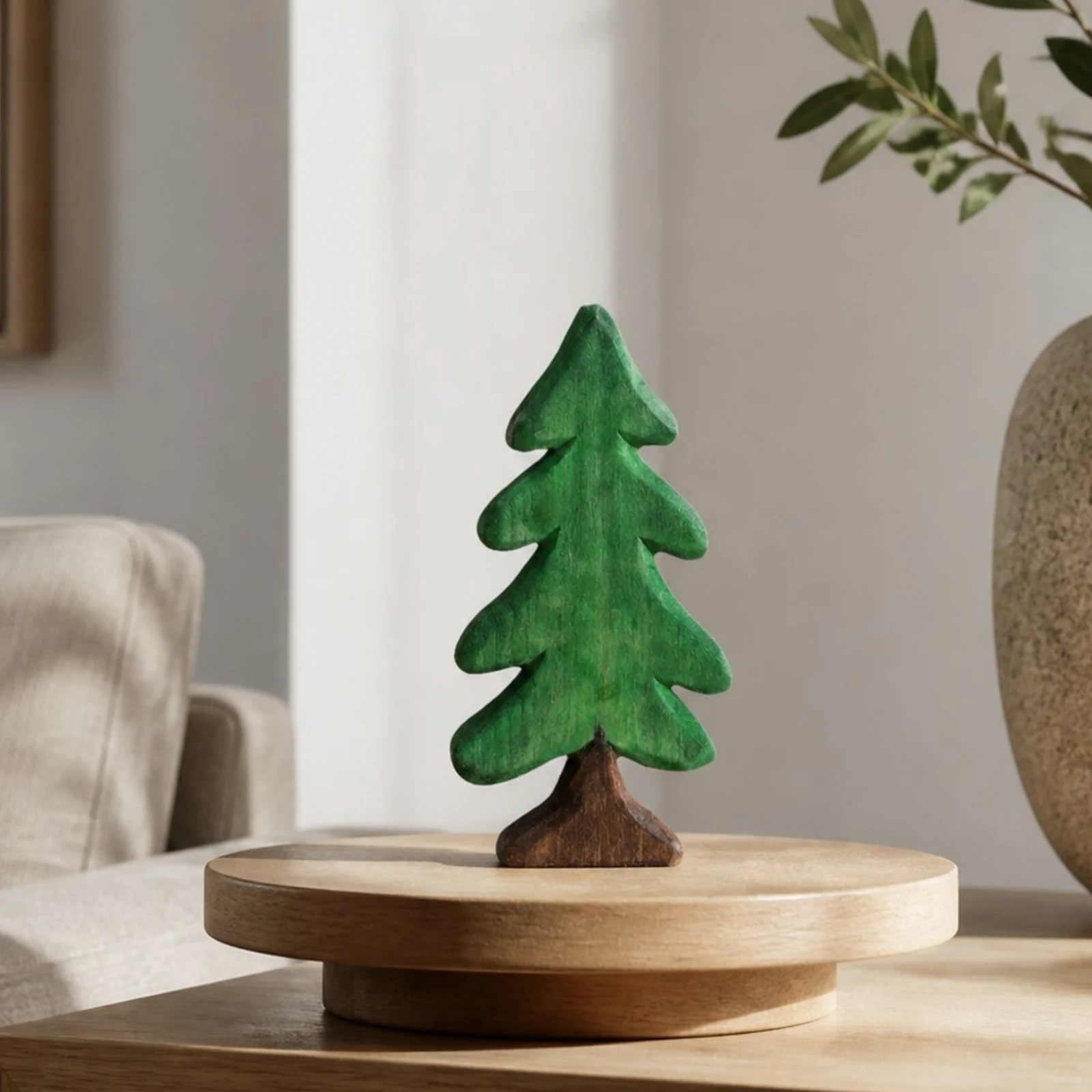 Wooden pine tree ornament on a round display stand