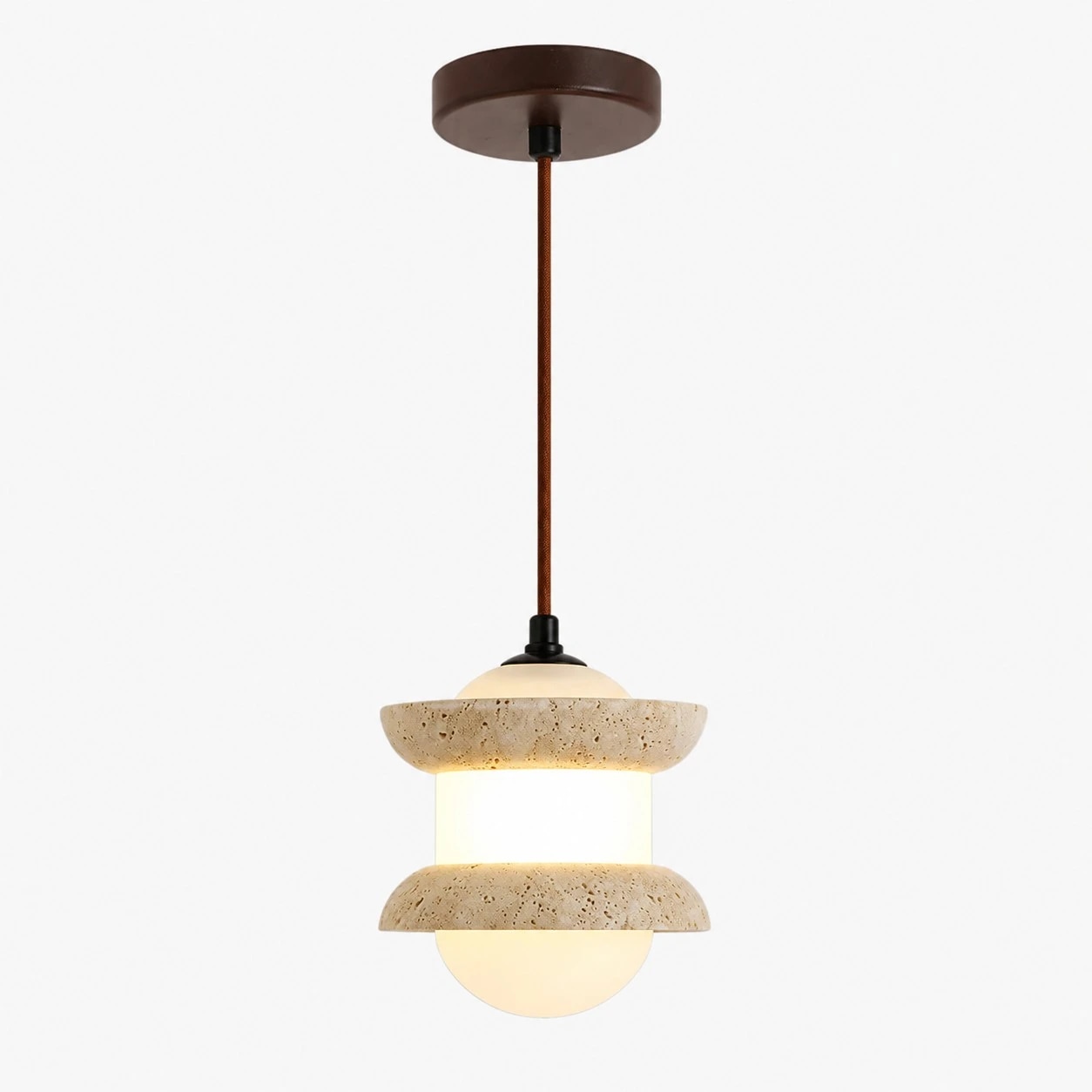 Single travertine stone pendant light on a plain background