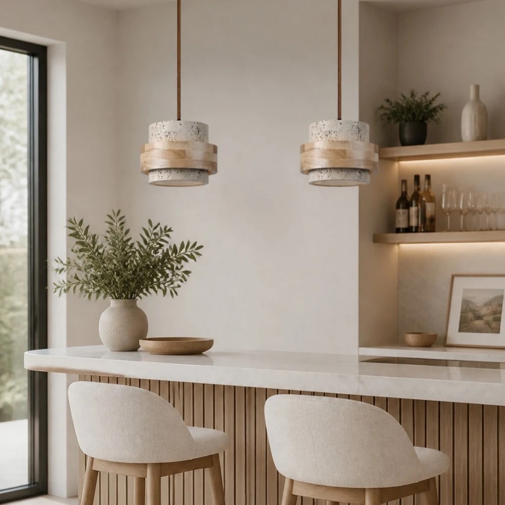 Travertine pendant lamps above a calm dining bar
