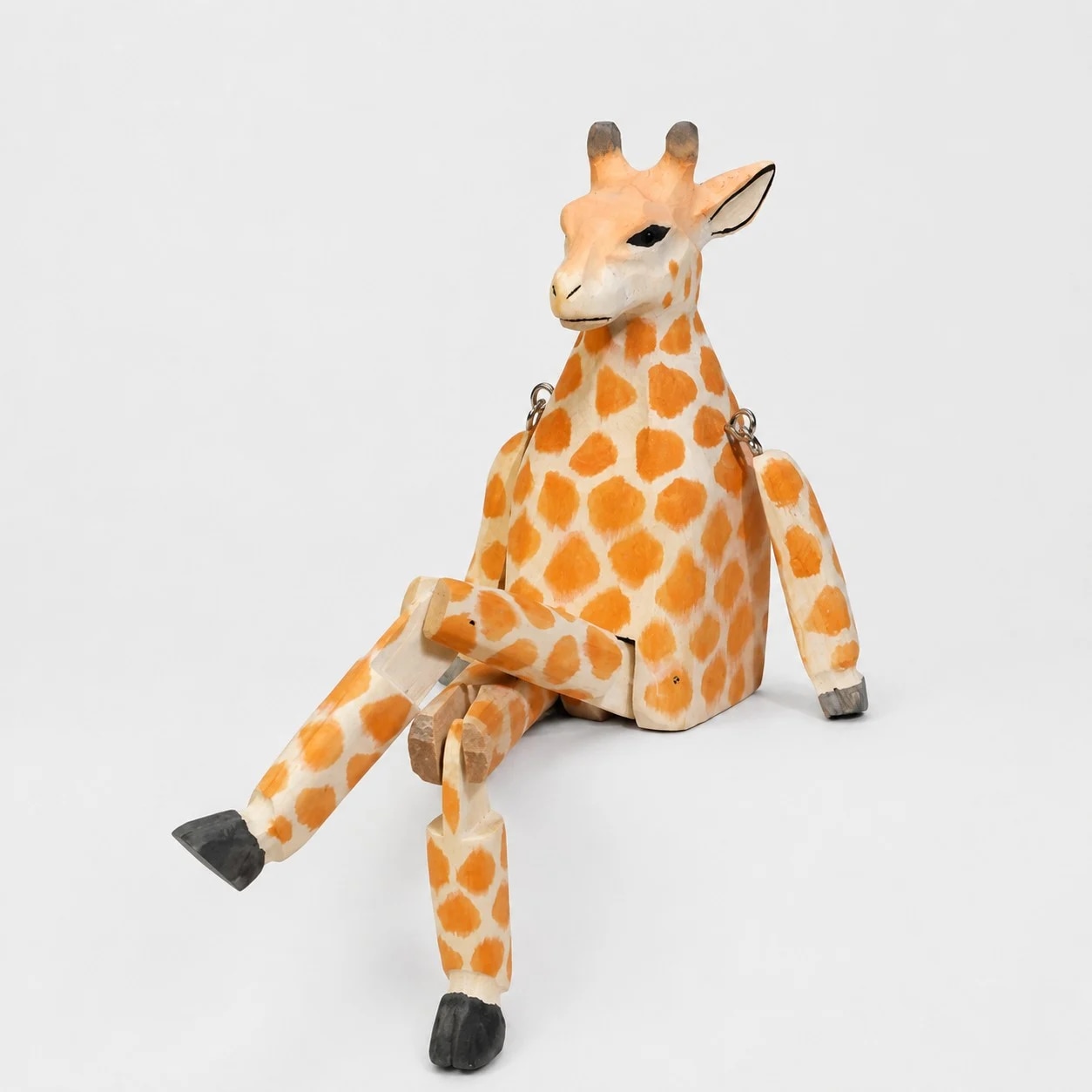 Hand-carved wooden giraffe ornament