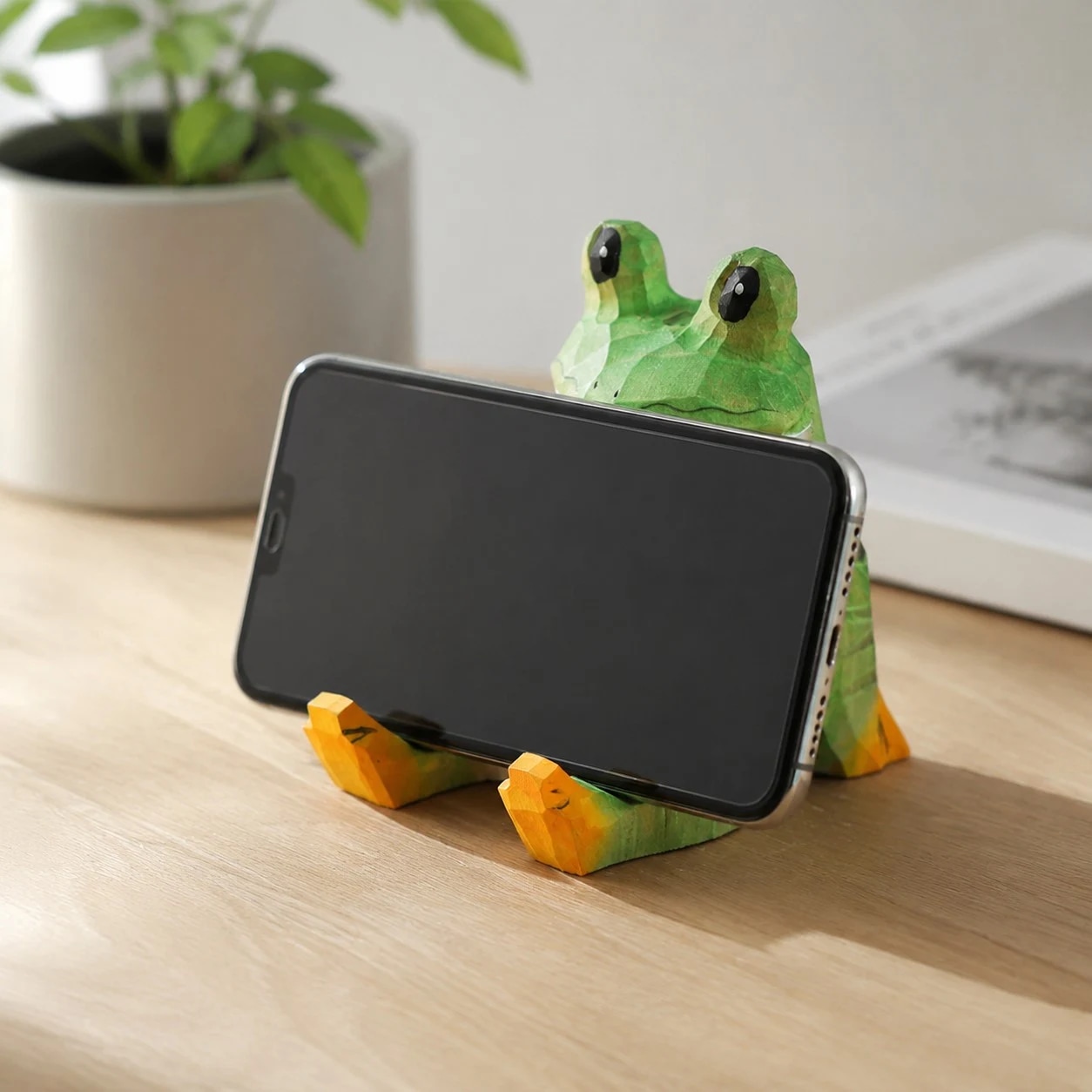Wooden animal phone stand scene view