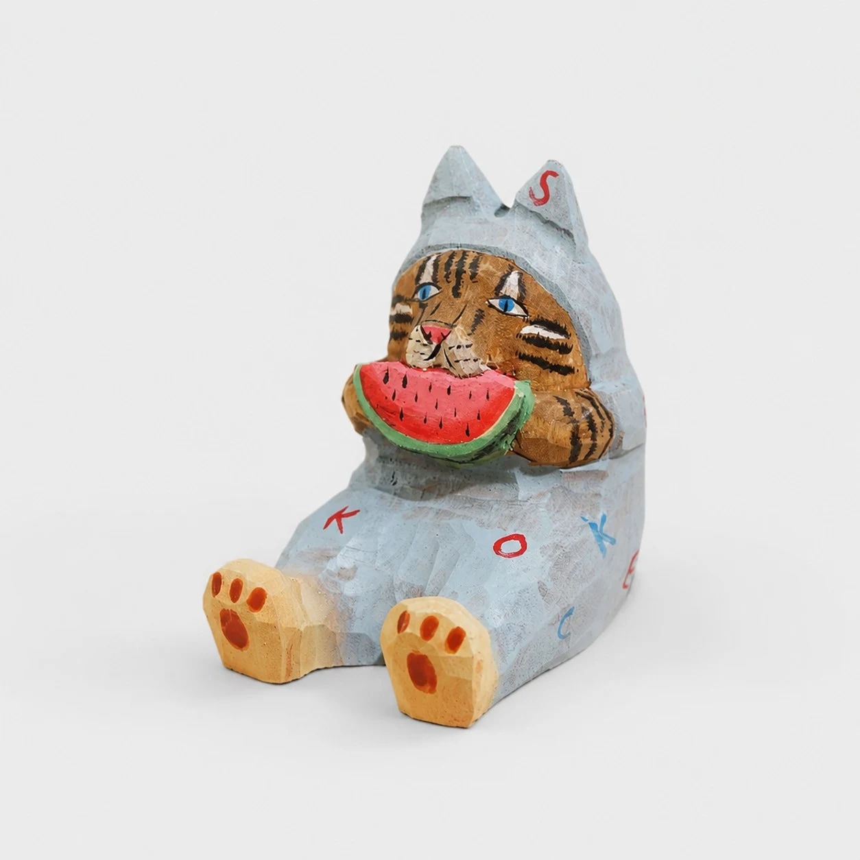 Hand-carved wooden animal phone stand