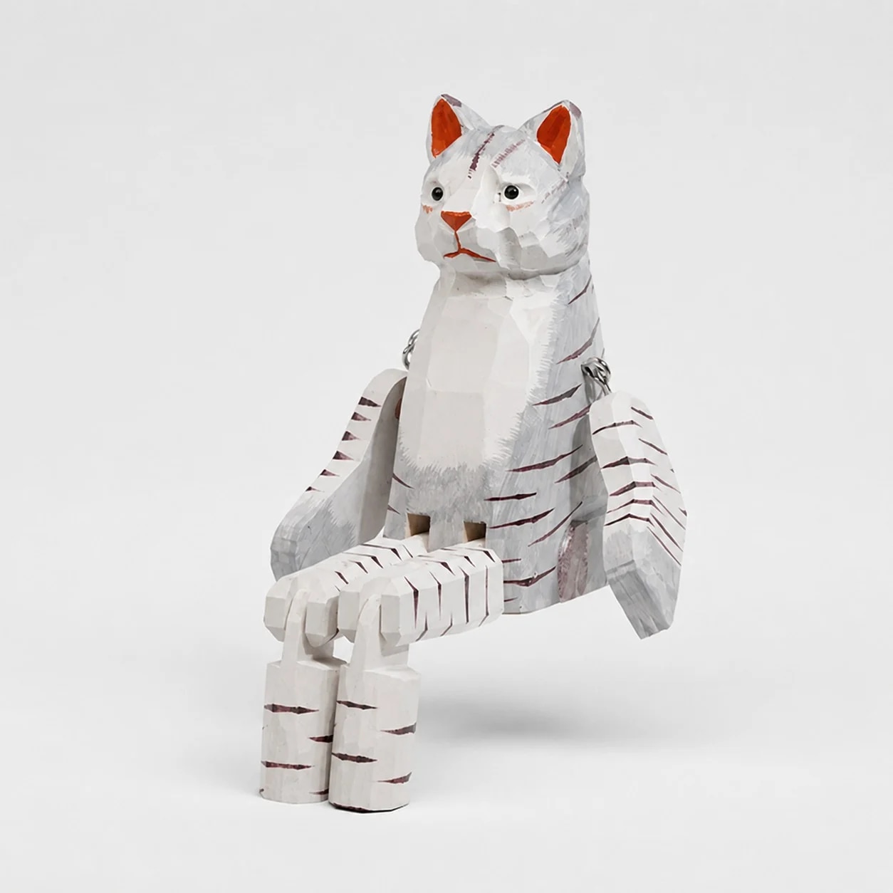 Hand-carved wooden cat ornament