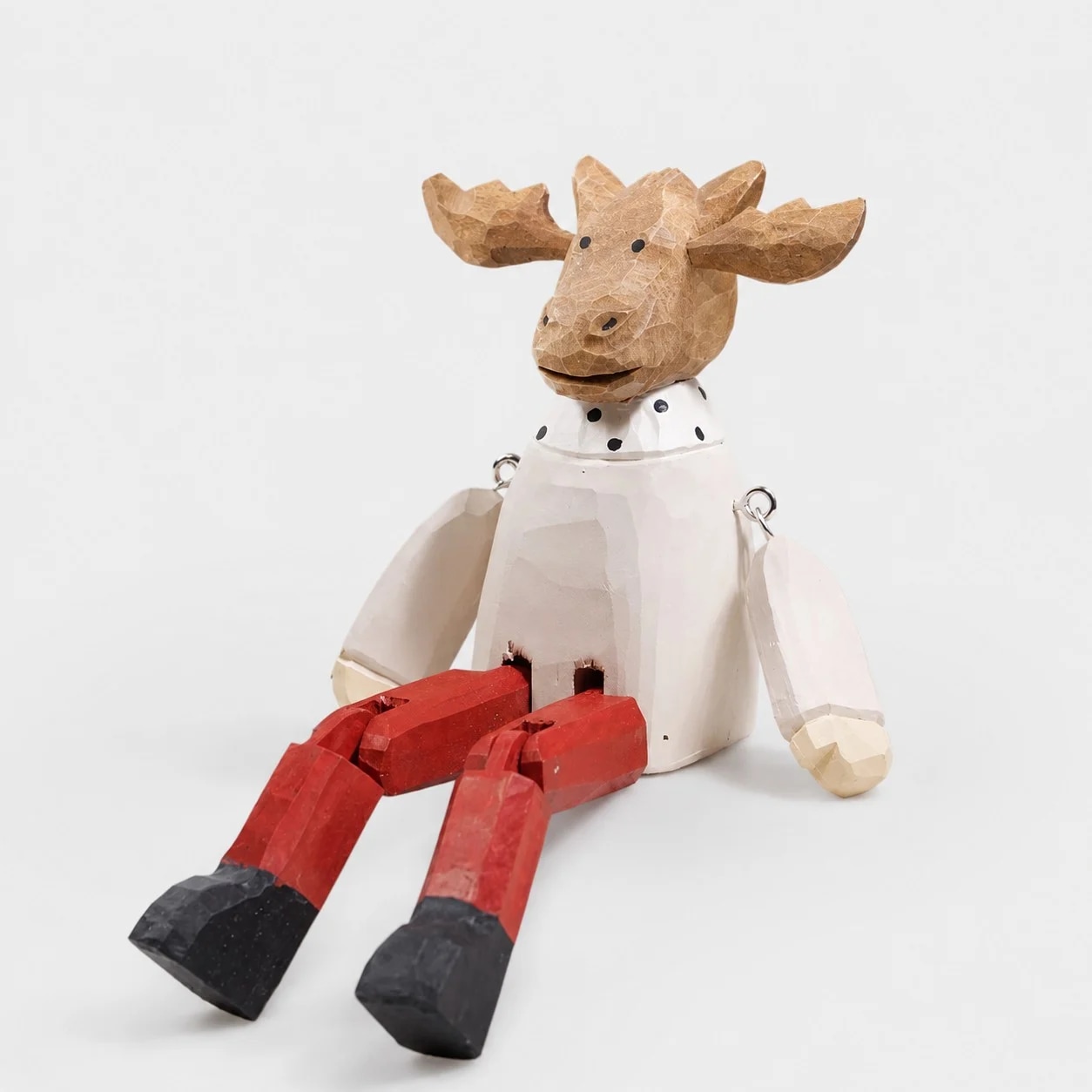 Hand-carved wooden christmas reindeer with red legs ornament