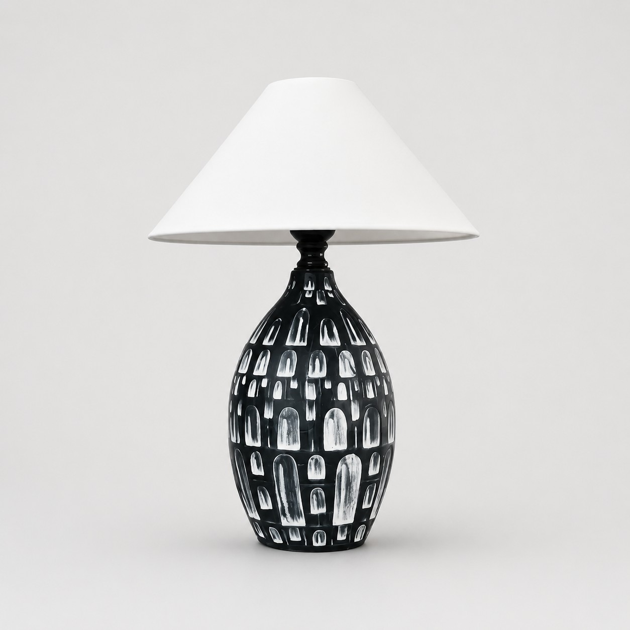 Black ceramic table lamp with white fabric shade front view