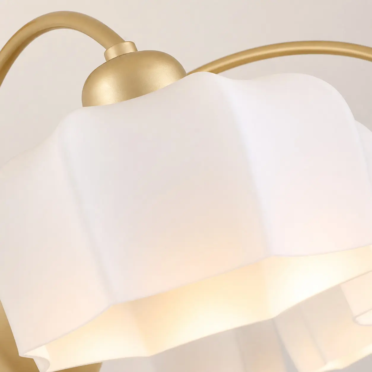 Close-up of the sculpted white glass flower shade
