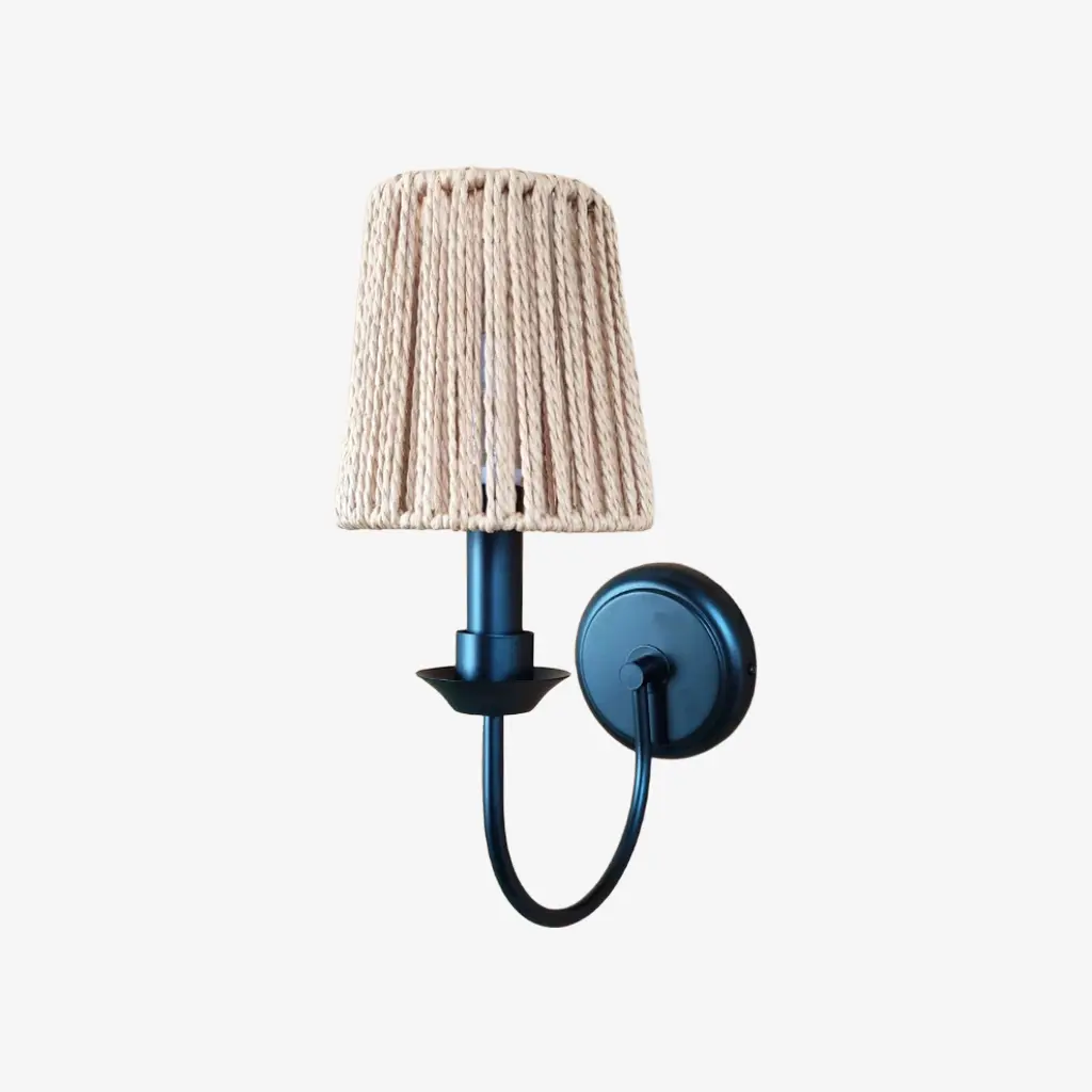 Matte black wall sconce with C woven shade