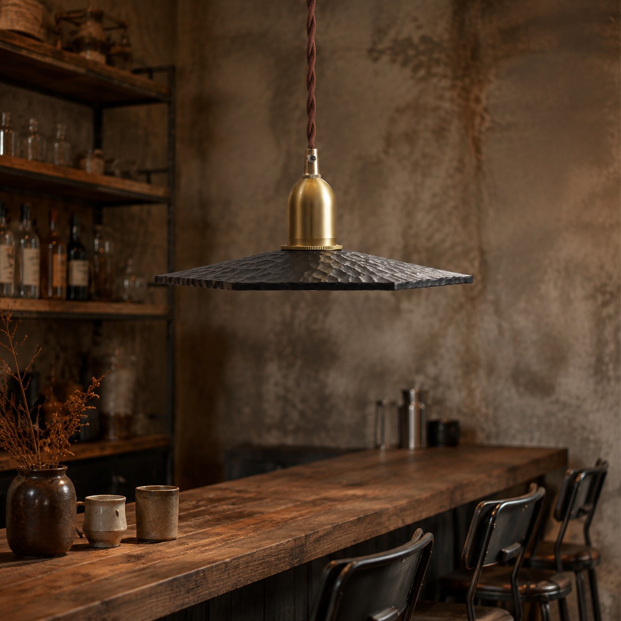 Octagonal wood pendant light installed over a dining table