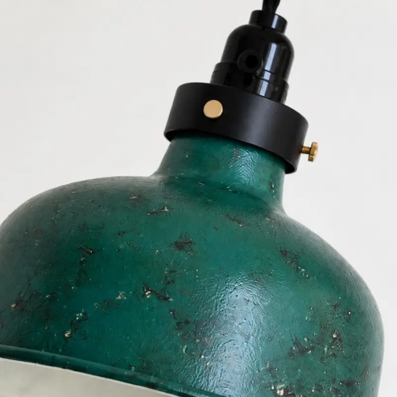 Close view of distressed metal shade