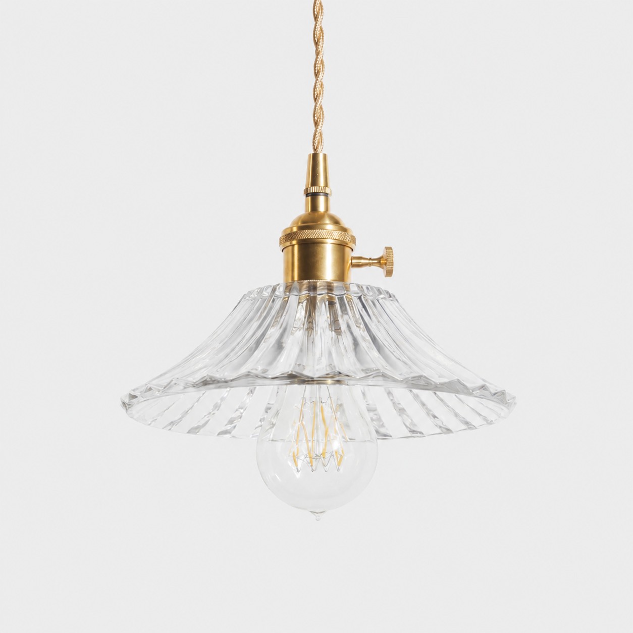 Style I textured glass shade with antique brass E27 socket, front view
