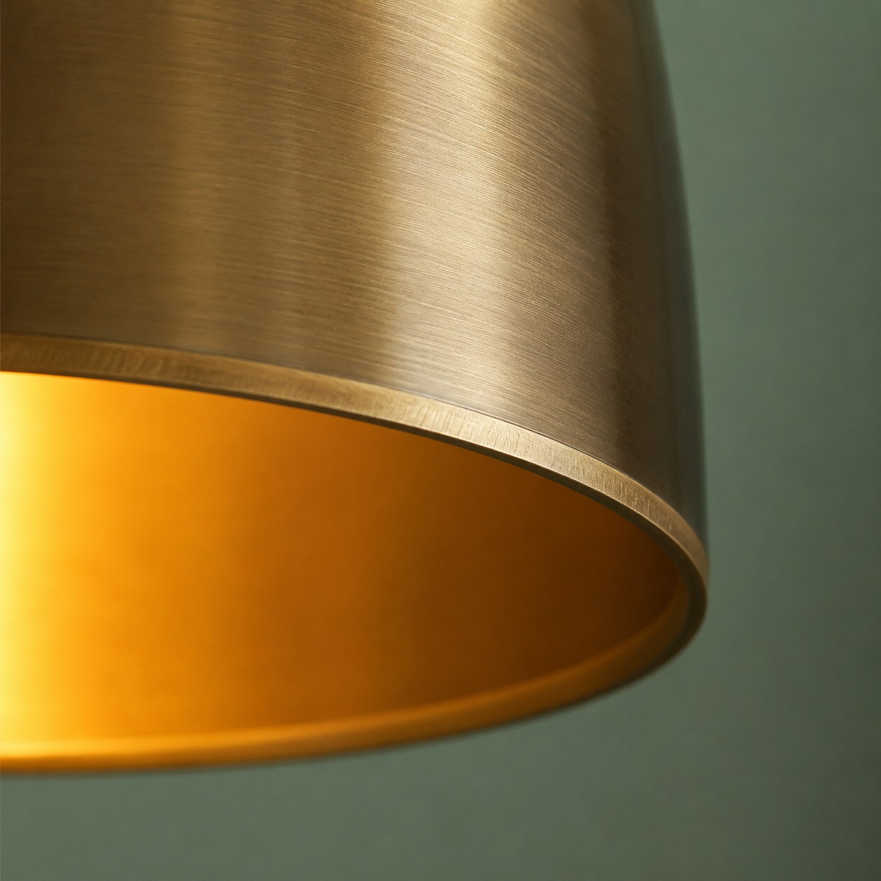 Close view of the brass shade rim and warm inner finish