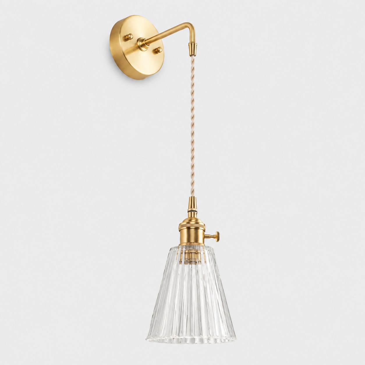 Clear glass wall light with brass arm, KW shade 12 cm high and 13 cm diameter