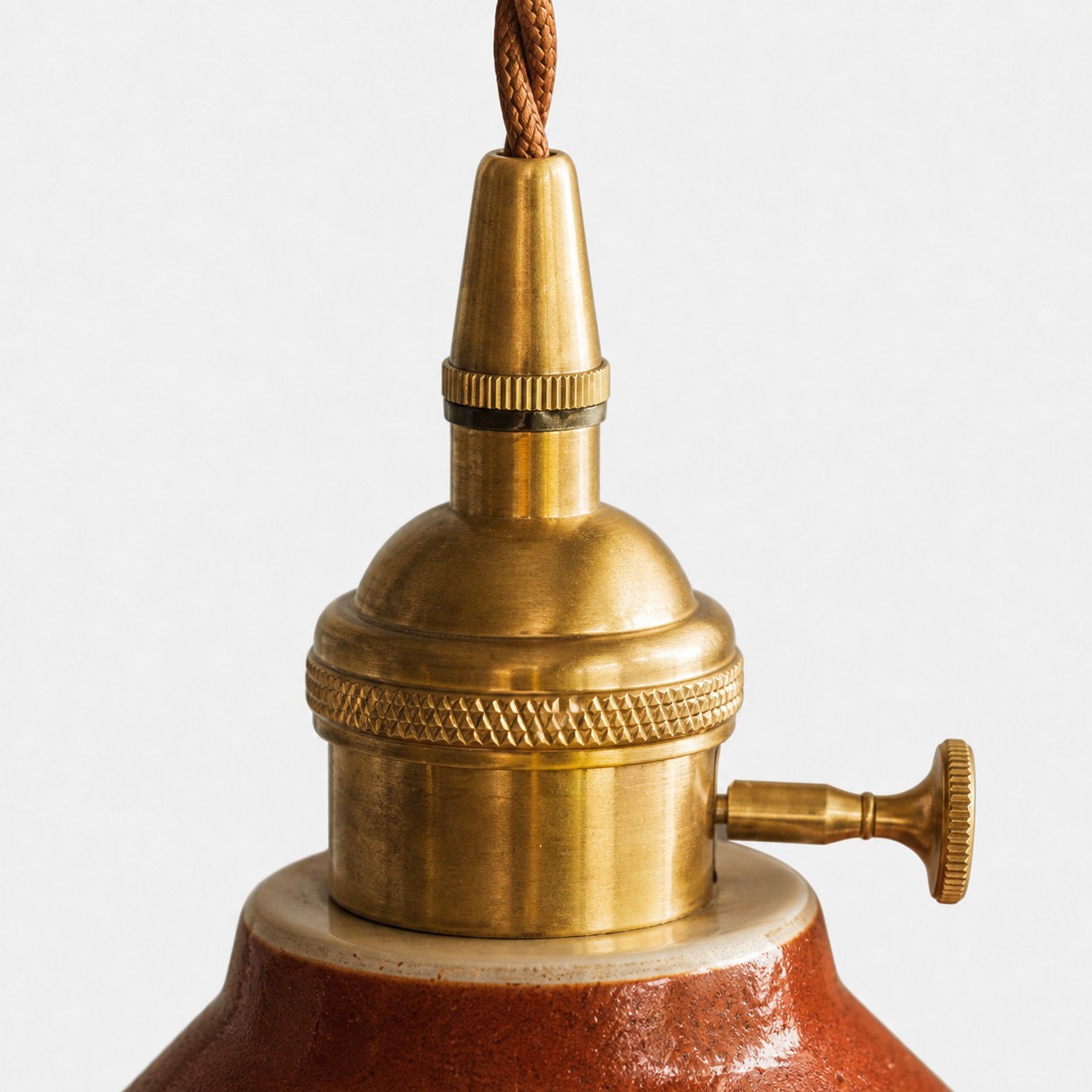 Antique brass-finished holder and side adjuster detail
