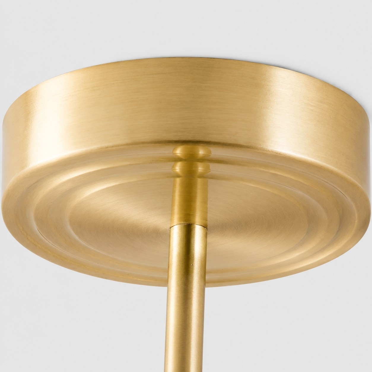 Detail: brass ceiling plate and downrod