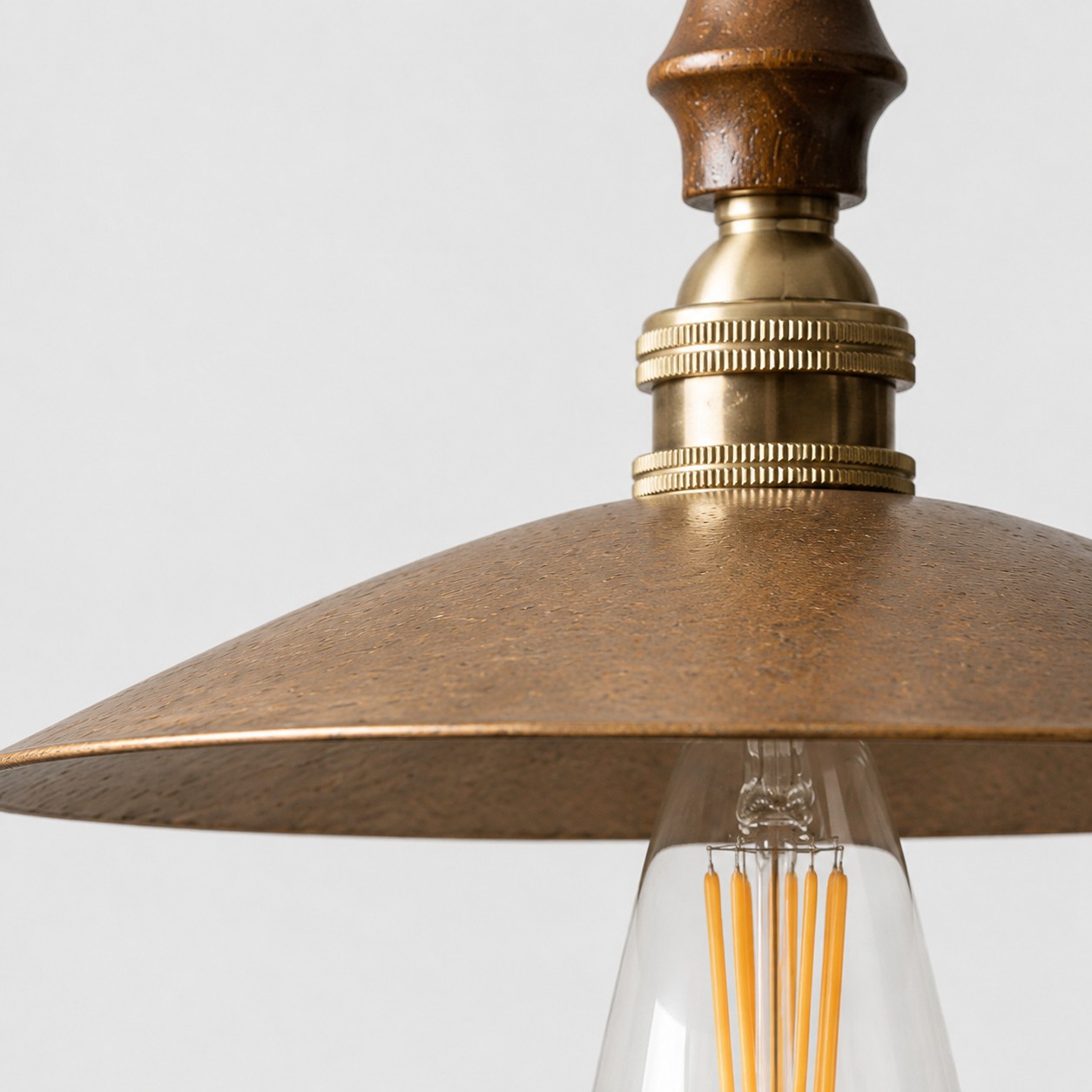 Close view of hammered brass shade texture