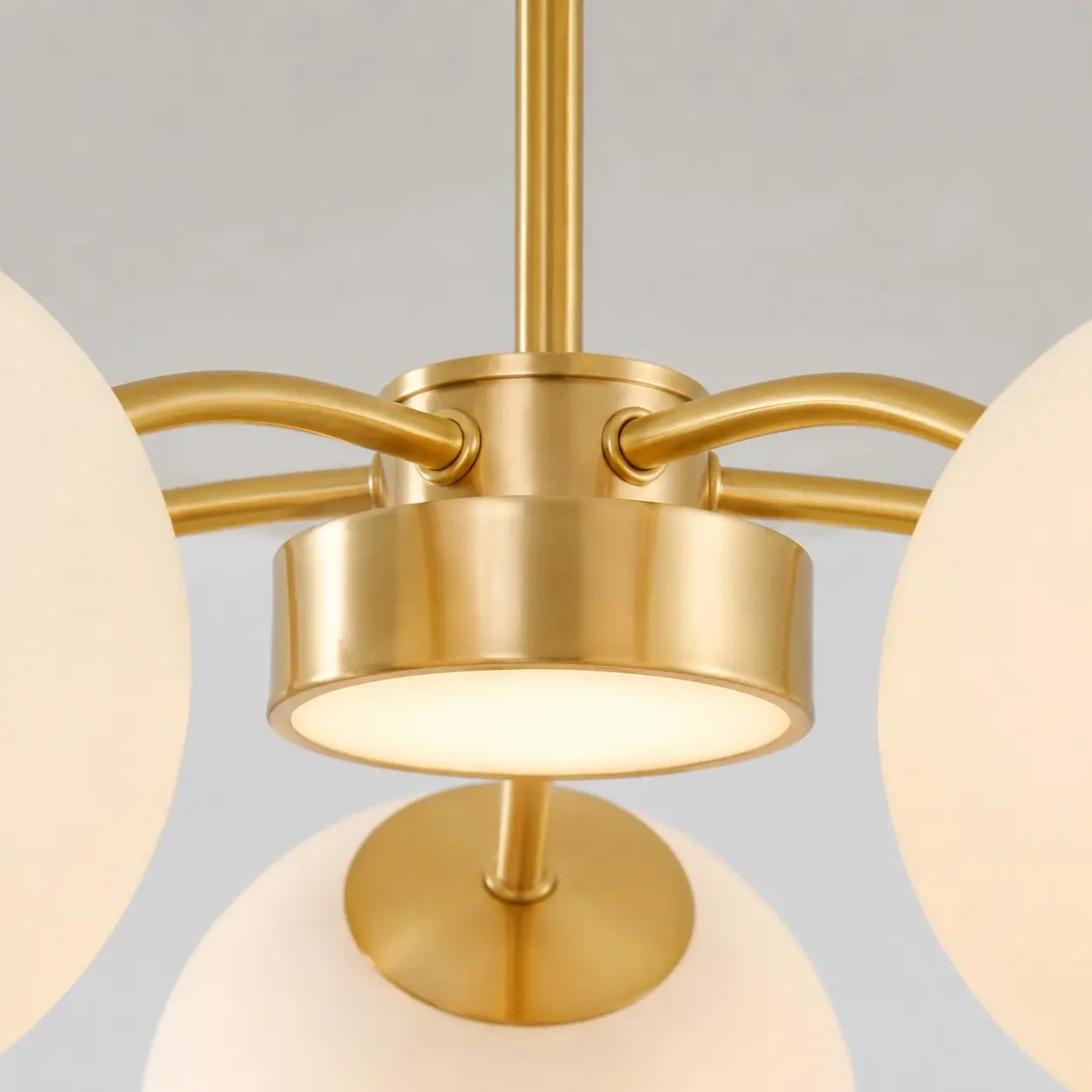 Gold metal chandelier central body detail