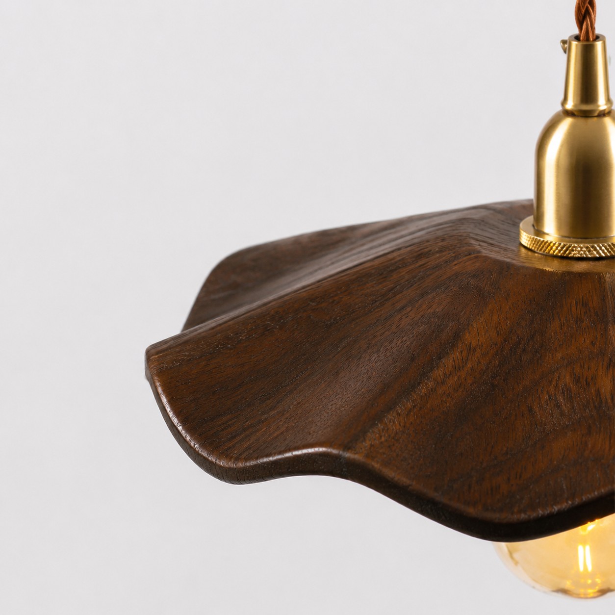 dark wood lotus pendant light carved rim detail