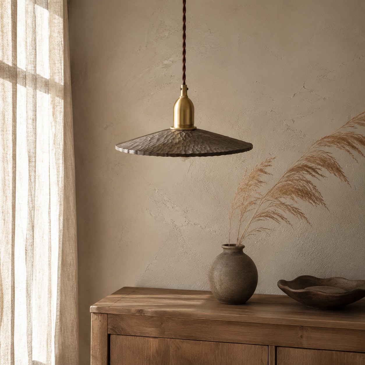 Octagonal wood pendant light beside a cabinet and window