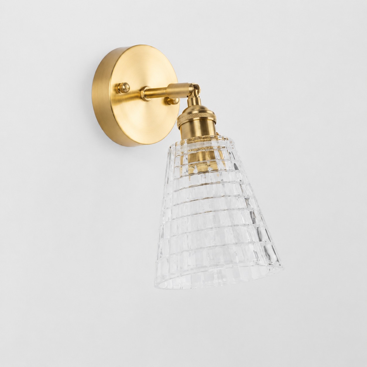Champagne gold glass wall light with brass arm, EZ shade 13 cm high and 12 cm diameter