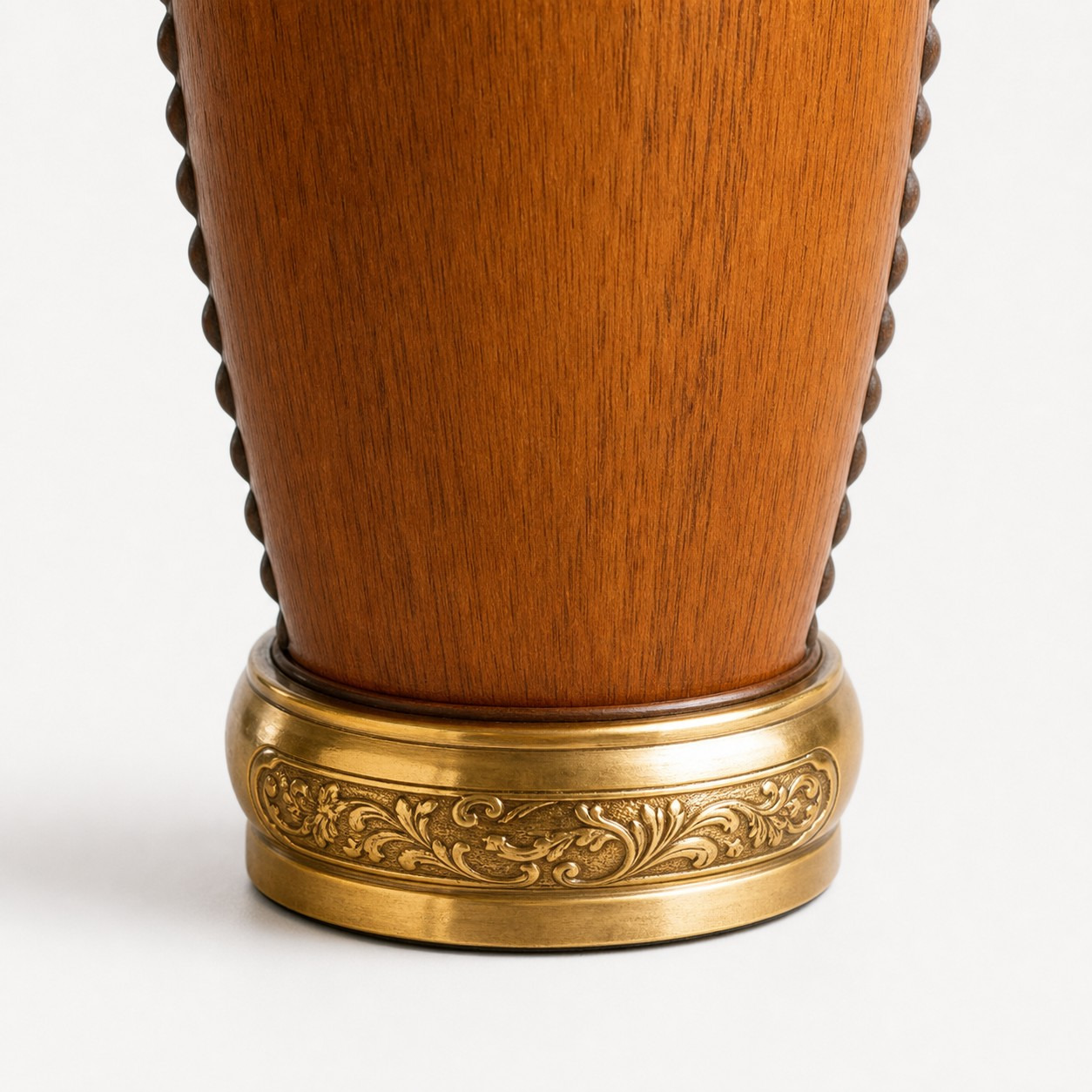 Decorated brass-tone base and wood grain
