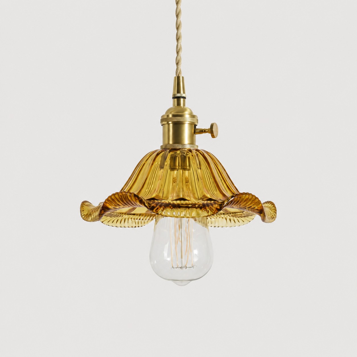 Style L - Amber textured glass shade with antique brass E27 socket, front view