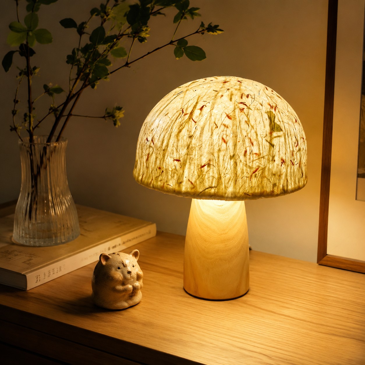 Mushroom table lamp glowing on a console table