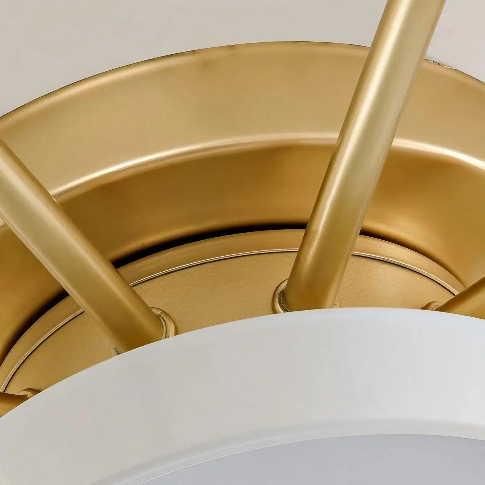 Close-up of the gold frame and shade connection