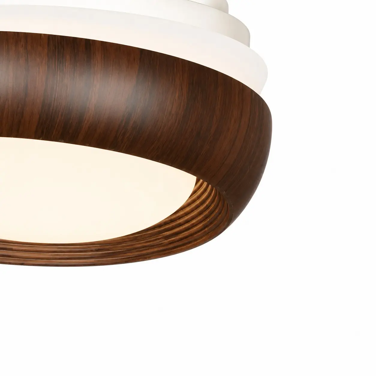Close view of the walnut-tone light housing