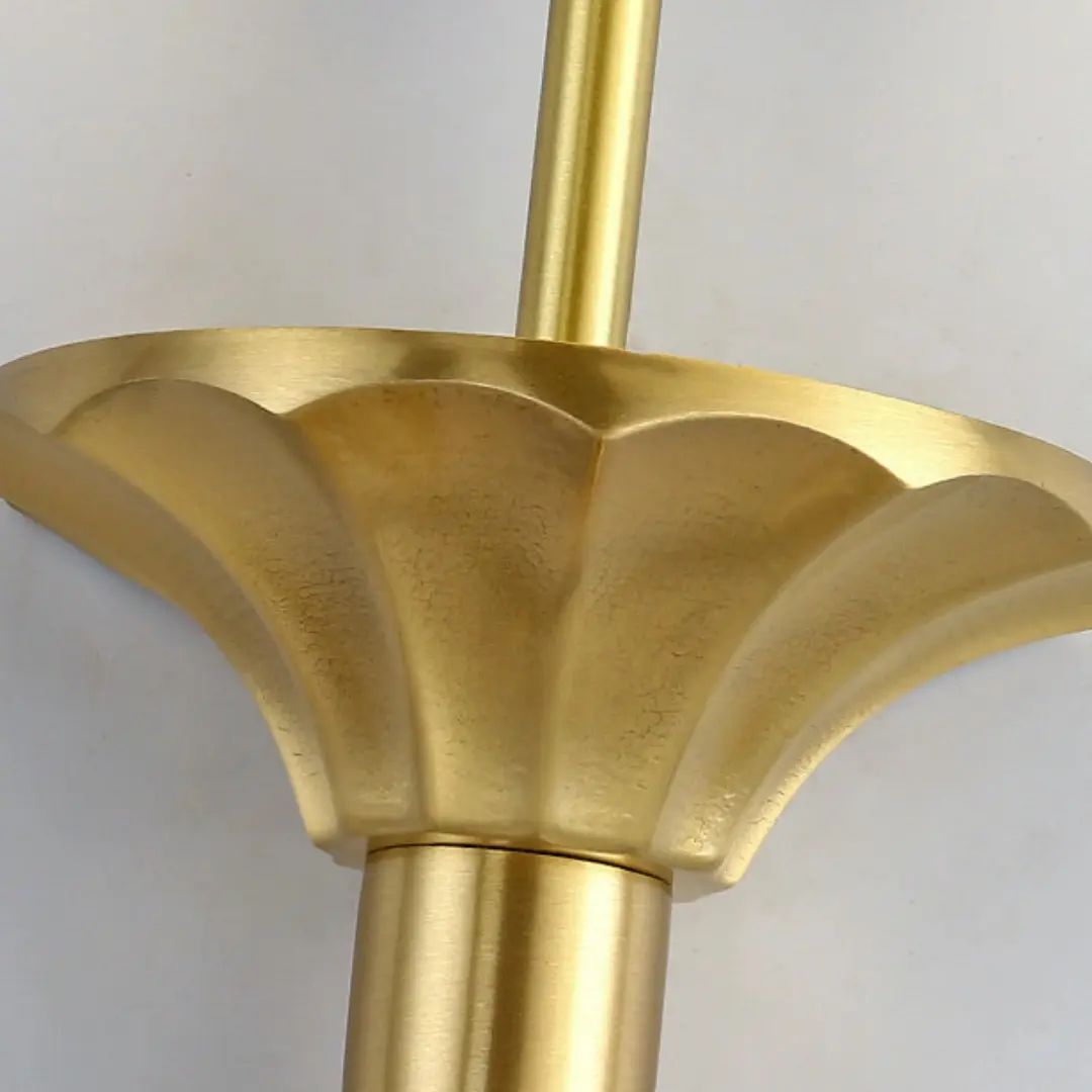 Floral-inspired brass cup detail