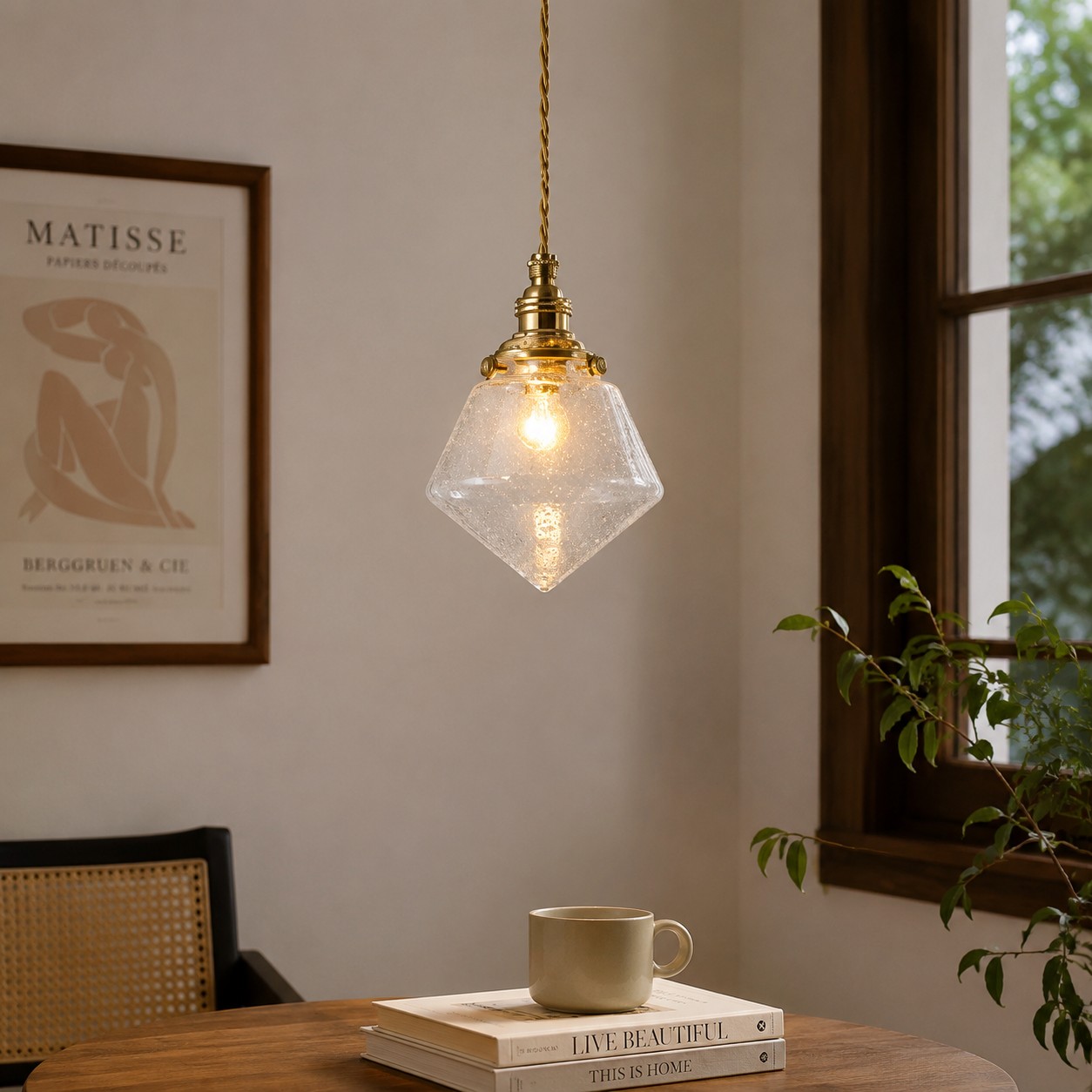 Bubble glass pendant beside a warm window nook