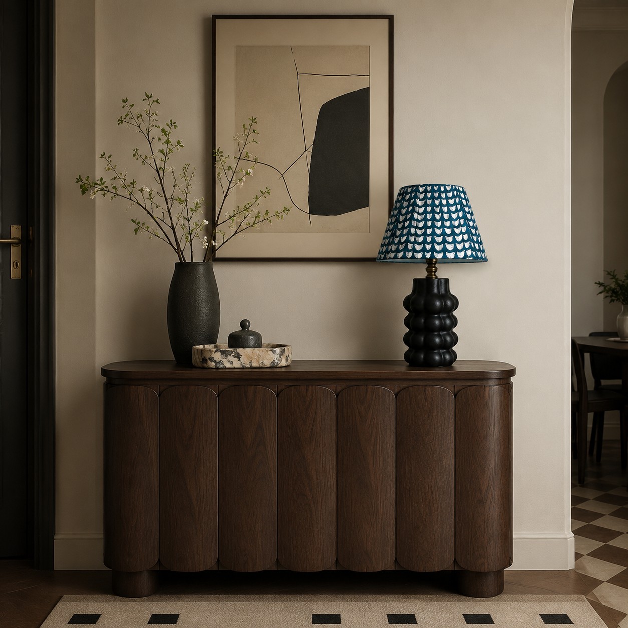 Sculptural ceramic table lamp styled on an entryway console