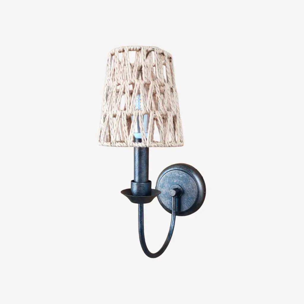 Antique brass wall sconce with B woven shade