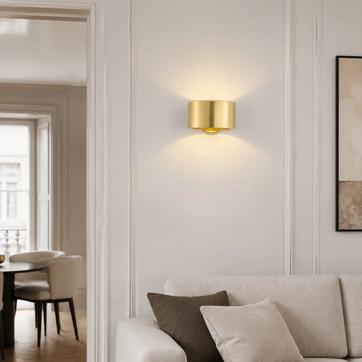 Gold brass wall light in a refined interior
