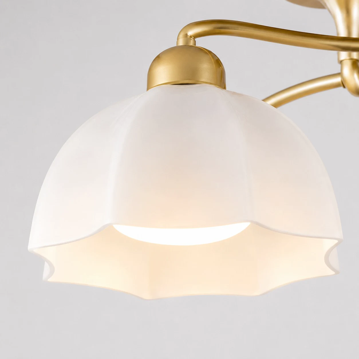 White flower-shaped glass shade detail