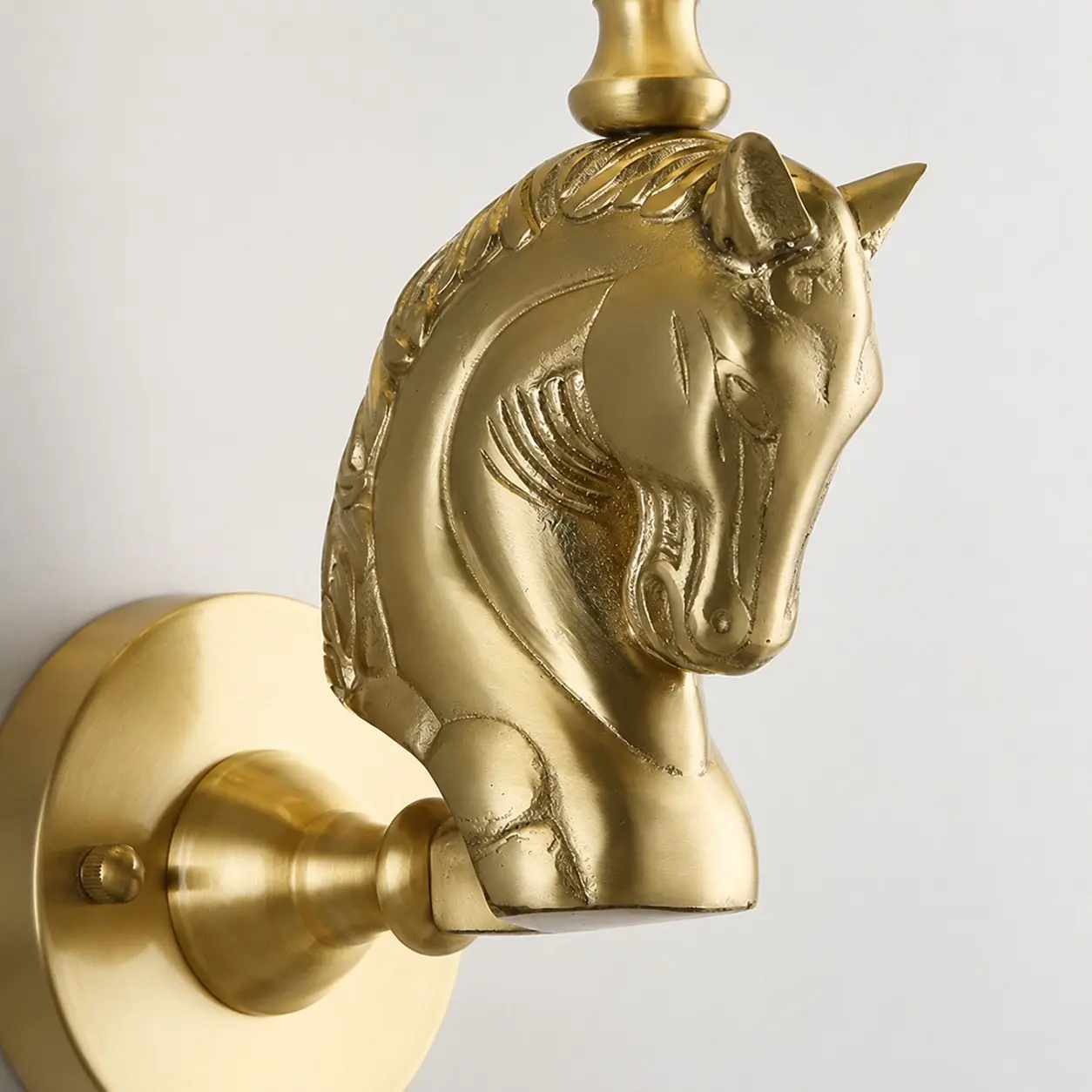Sculpted horse head wall lamp detail