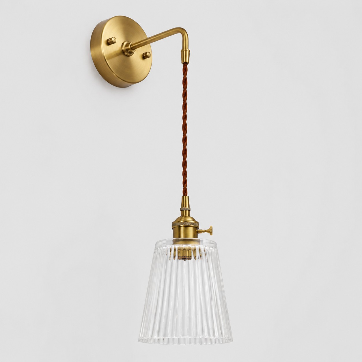 Sky blue glass wall light with brass arm, MW shade 12 cm high and 13 cm diameter