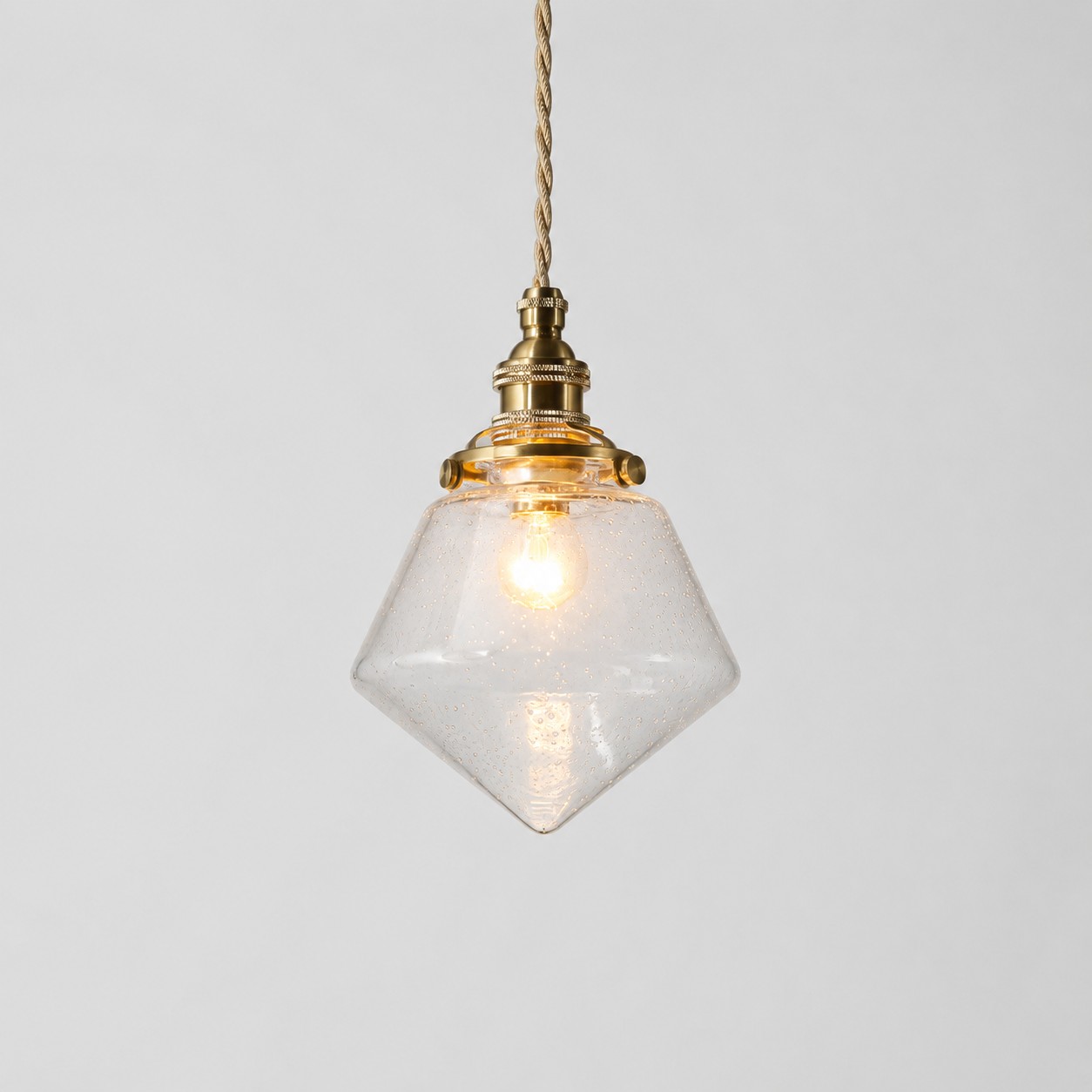Bubble glass pendant with clear shade and warm canopy