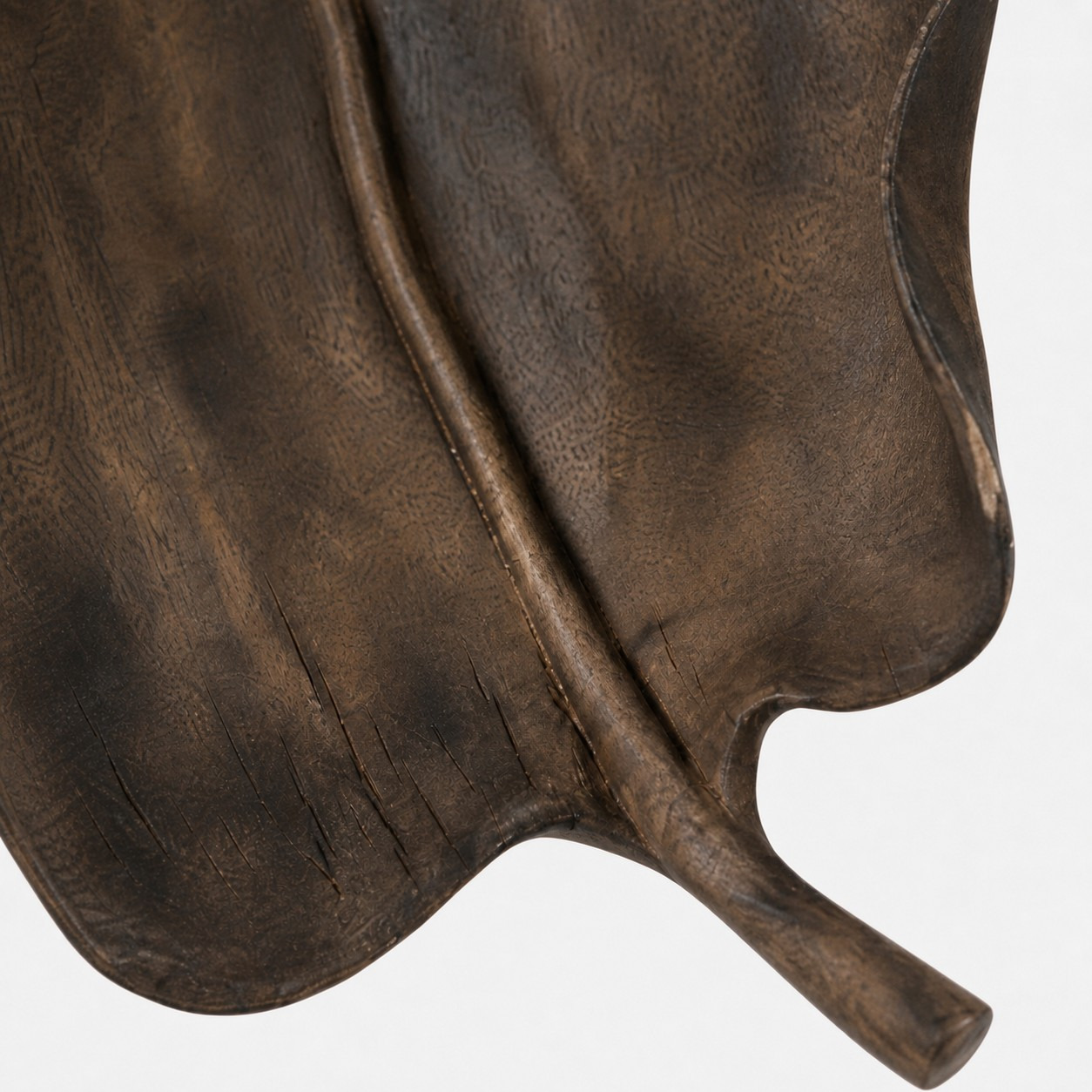 Raised carved leaf vein detail