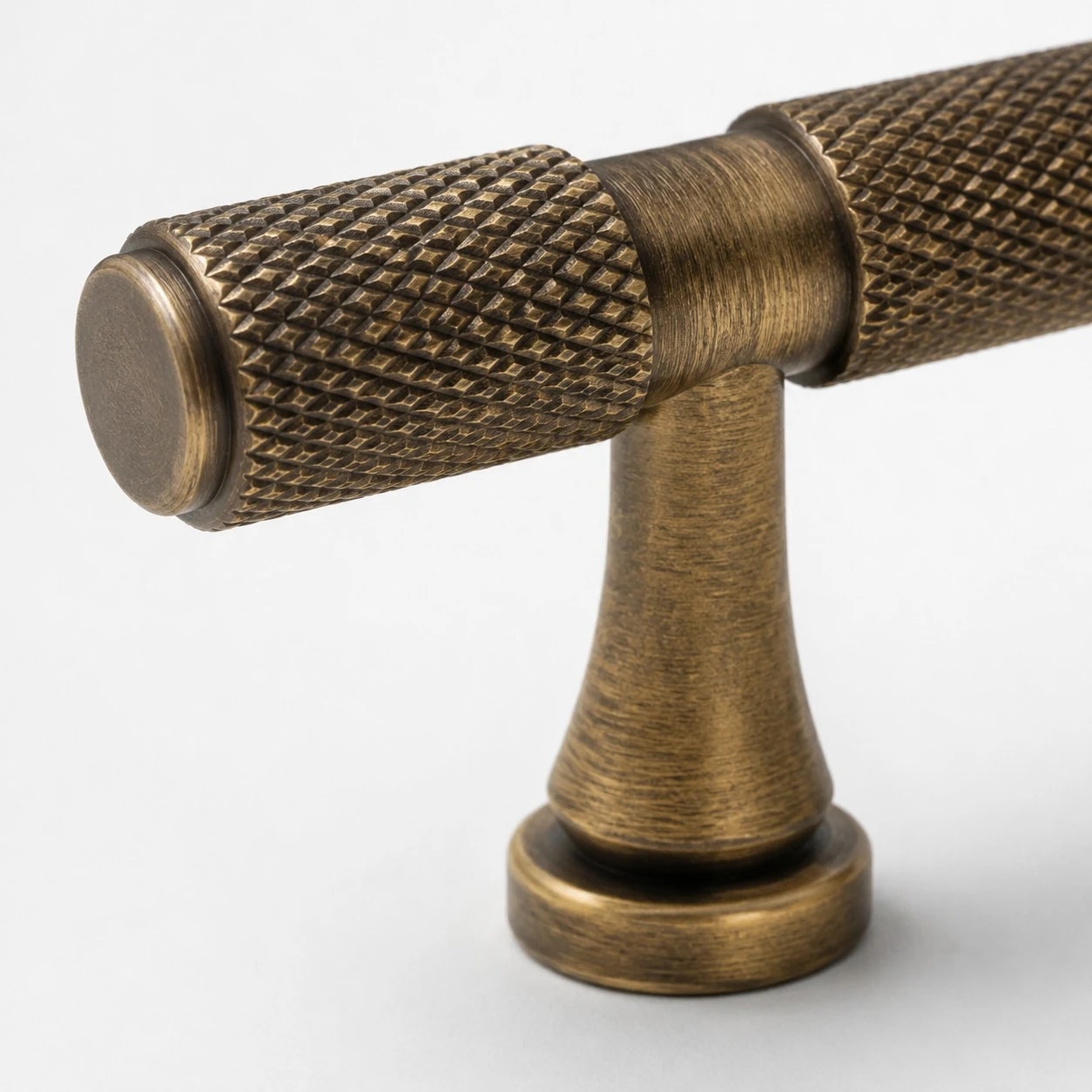 Knurled antique brass cabinet pull end detail