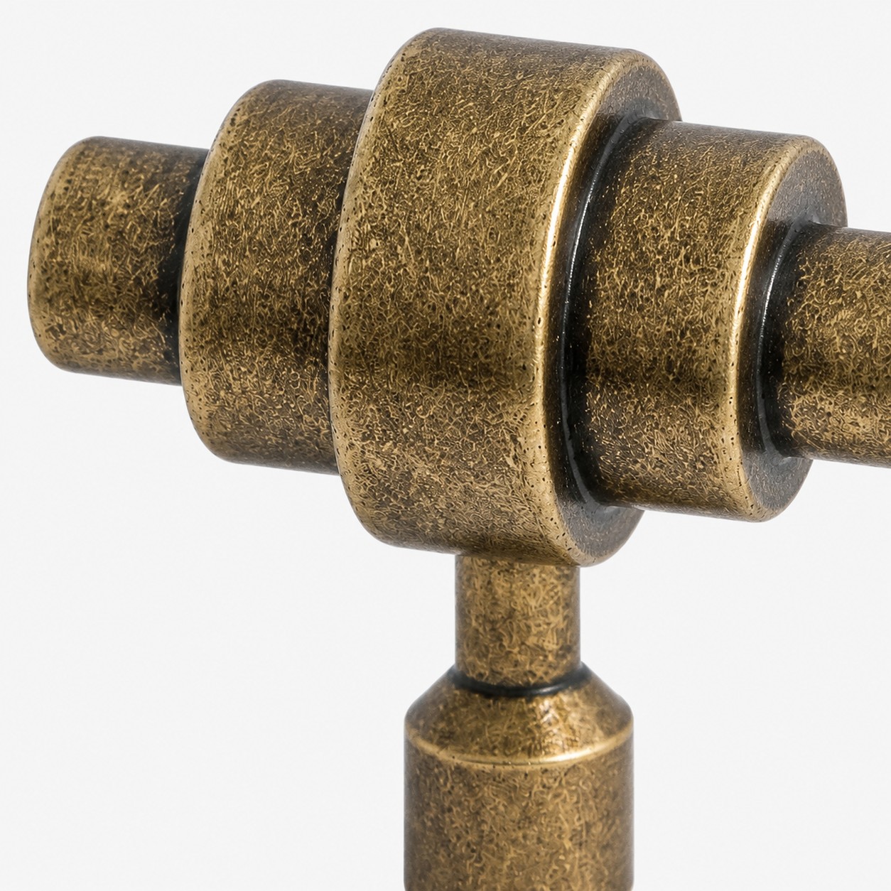 Stepped solid brass form and antique textured finish