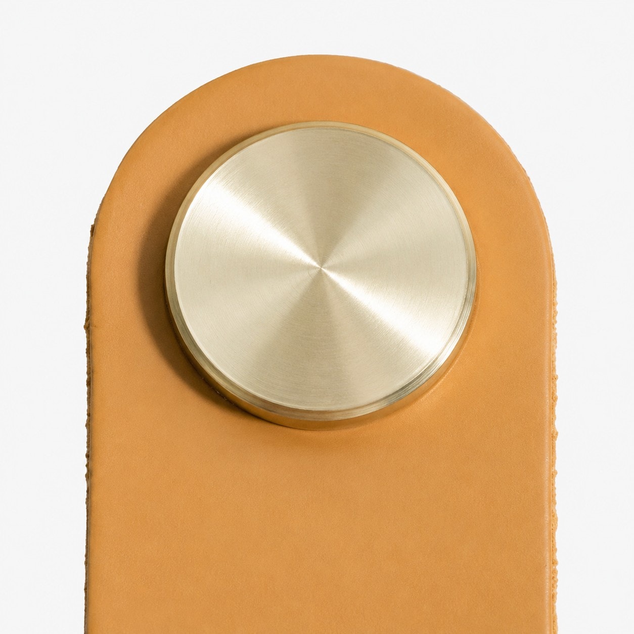 Cowhide leather and brass cabinet pull handle detail and lifestyle image