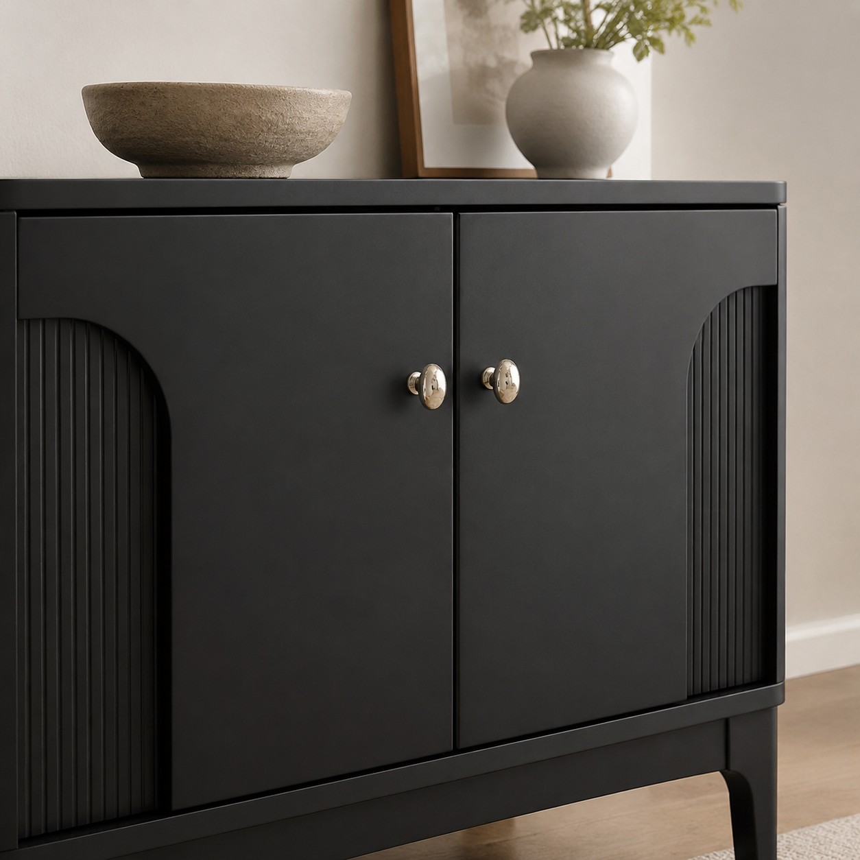Solid brass knob on a cabinet door