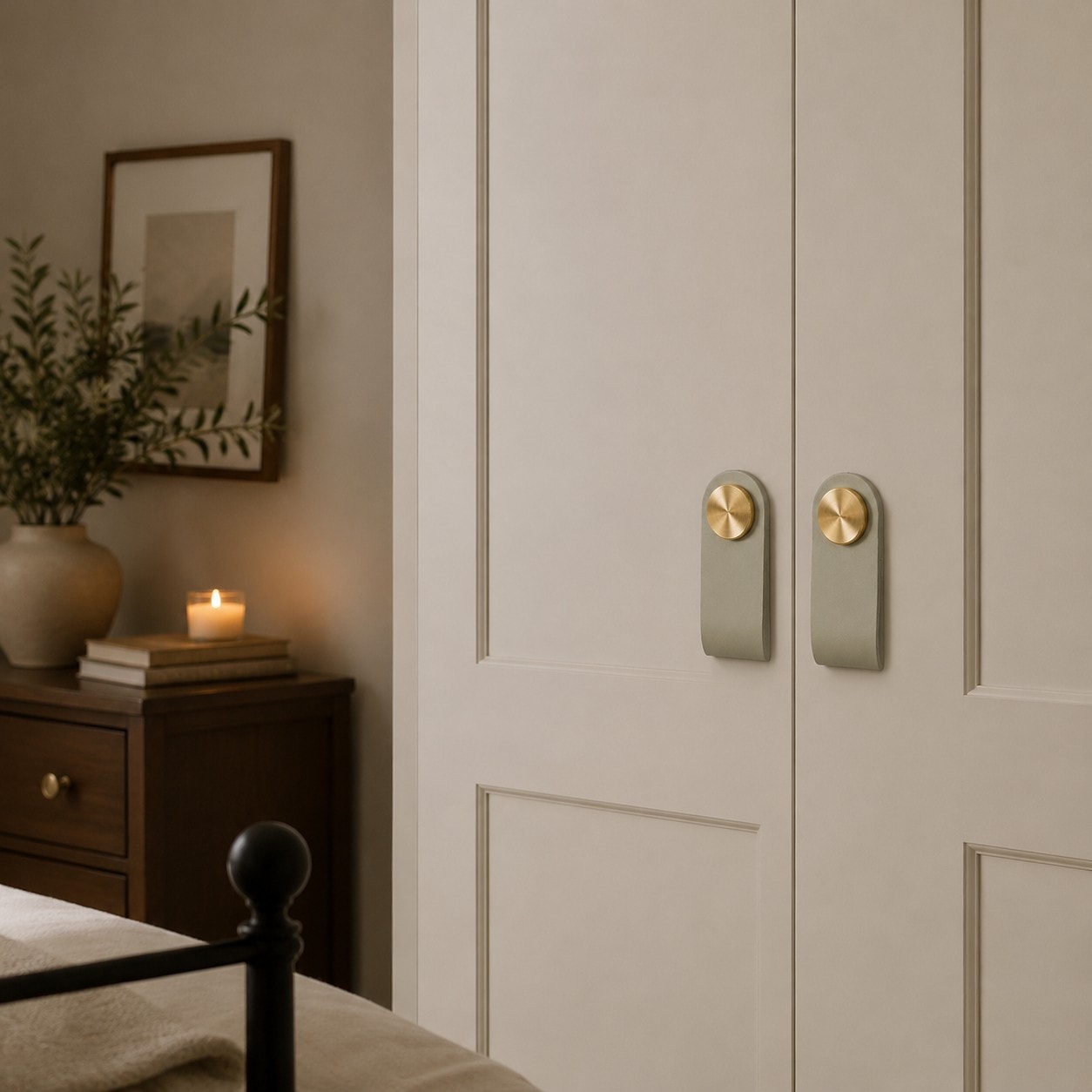 Cowhide leather and brass cabinet pull handle detail and lifestyle image